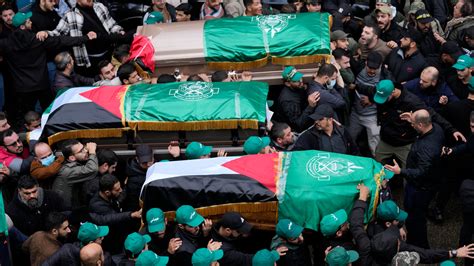 Thousands attend the funeral of a top Hamas official killed in an apparent Israeli strike in Beirut